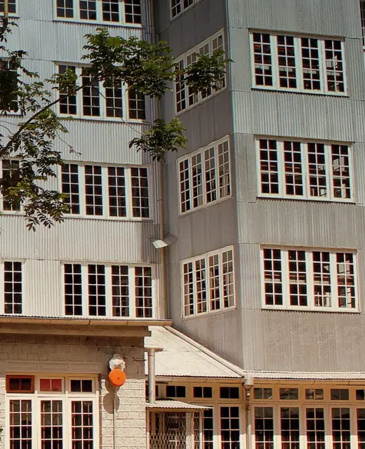 Historic timber and corrugated-steel tea factory building in Sri Lanka's hill country